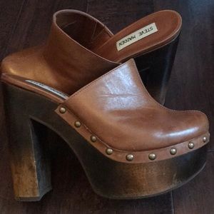 Steve Madden leather platform clogs.